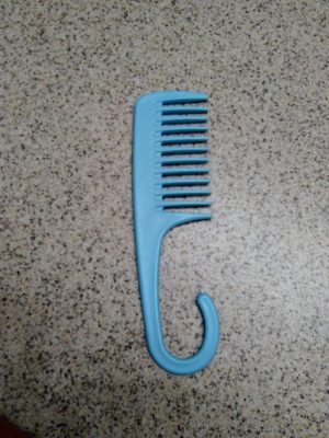 Detangler shower comb