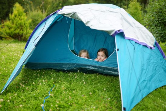 girls in a tent scaled e1624898966789